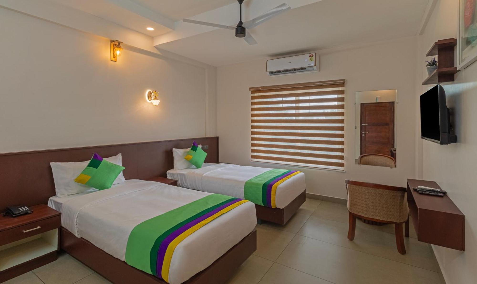 Treebo Amigos Residency Cochin Airport Hotel Kochi エクステリア 写真
